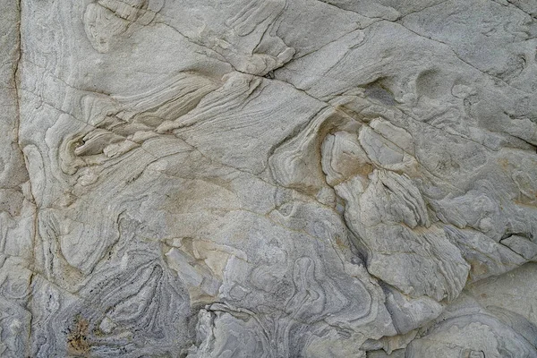 Natural drawings on stone near river in Carpathian Mountains in Ukraine