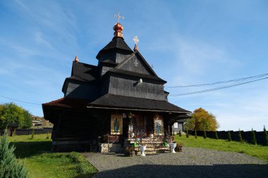 Church of Nativity of Blessed Virgin Mary of 17-18 centuries in Vorokhta, western Ukraine, Carpathians. Church belongs to Hutsul school of traditional temple building, was build without nails