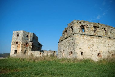 Stone ruins in Pniv Castle - medieval historical object in Ivano-Frankivsk region of western Ukraine