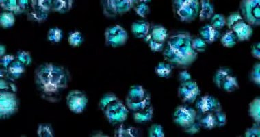 Renkli, farklı boyutlarda, renk değiştiren toplar siyah boşlukta yükselir