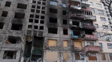 After bombing. Russian terrorists destroyed by shell dwelling house on Obolon district in Kyiv city on March 2022. War in Ukraine. Terror and genocide of Ukrainian people. Russia - terrorist country