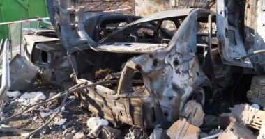 After bombing. Cars burned by russian missile in Kyiv city. War in Ukraine. Terror and genocide of Ukrainian people