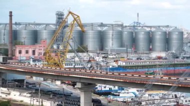 ODESSA, UKRAINE, SEPTEMBER 5, 2019: Cars on the bridge near Odessa port - largest Ukrainian seaport and one of largest ports in Black Sea basin