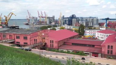 UKRAINE, ODESSA, SEPTEMBER 7, 2019: View on red warehouses in Odessa port - largest Ukrainian seaport and one of largest ports in Black Sea basin