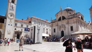 DUBROVNIK, CROATIA, JUNE 28, 2019: People near Saint Vlaho Church in Dubrovnik old town, Croatia