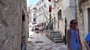 MONTENEGRO, KOTOR, JULY 1, 2019: People inside old historical town of Kotor - coastal town in Montenegro, Bay of Kotor, Adriatic Sea