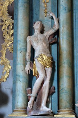 Aziz Sebastian, Hırvatistan 'ın Hrascina kentindeki Aziz Nicholas kilisesindeki İşçi Aziz Isidore sunağında heykel.