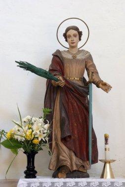 Aziz Catherine, Hırvatistan 'ın Komarevo kentindeki İskenderiyeli Aziz Catherine Kilisesi' nde heykel.