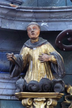 Statue of the saint on the altar of St. Francis of Assisi in the church of St. Catherine of Alexandria in Krapina, Croatia clipart