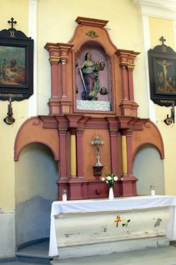 Altar of Saint Barbara in the parish church of Saint Emeric in Kostel, Croatia clipart