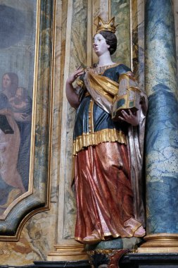 Statue of Saint Cecilia on the altar in the church of Saint Leonard of Noblac in Kotari, Croatia clipart