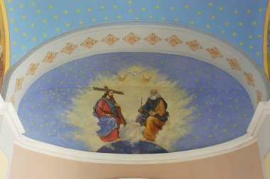 Holy Trinity, fresco on the ceiling of the parish church of the Visitation of the Virgin Mary in Topusko, Croatia clipart