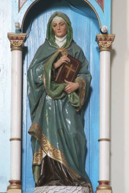 Saint Anne, statue on the altar of the Assumption of the Virgin Mary in Saint Peter parish church in Sveti Petar Cvrstec, Croatia clipart