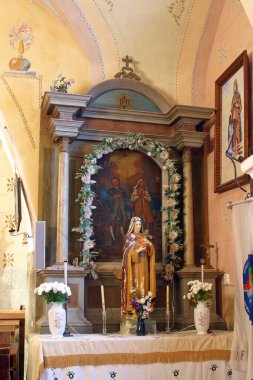 Hırvatistan 'ın Velika Erpenja kentindeki Kutsal Üç Kral kilisesinde Aziz Isidore ve Maria Torribia sunağı