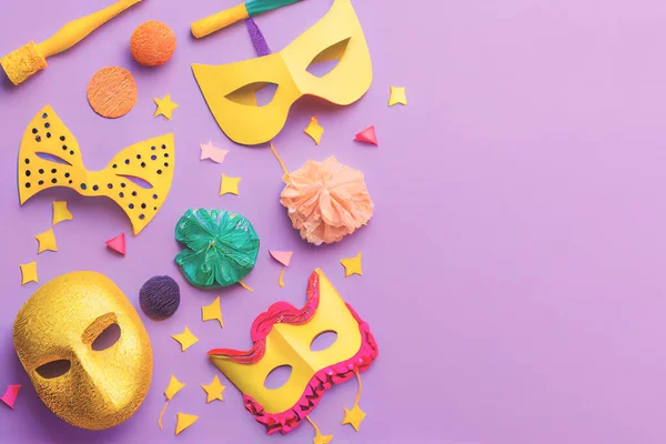 Various types of masks displayed on purple background, illustration Purim celebration concept and Jewish carnival holiday. Top view, flat lay.