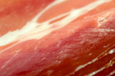 Et pazarı arka planı, jamon kesme, yakın çekim, makro fotoğraf.