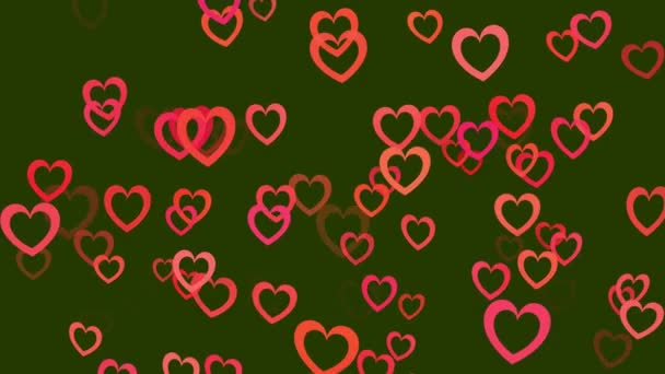 赤いハートは緑の背景 バレンタインデーのビデオ背景にスムーズに浮かびます — ストック動画