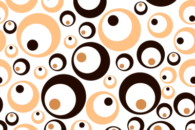 Değişen boyutlardaki renkli daireler, sıcak renklerde ve soyut bir tasarım oluşturur..