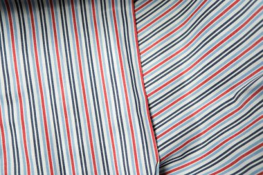 Karmaşık çizgili kumaş renk ve dokuların güzel bir karışımını gösterir.