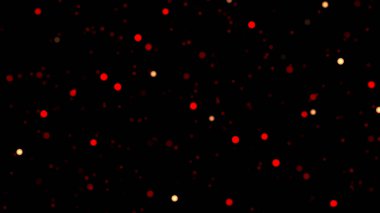 Kırmızı ve altın ışıklar karanlık bir arka planda parlıyor, neşeli bir atmosfer yaratıyor..