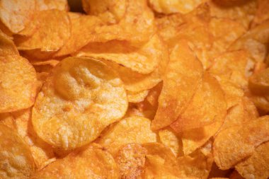 tasty crispy potato chips background