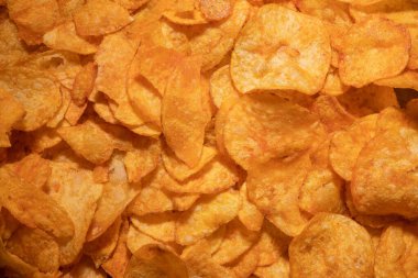 tasty crispy potato chips background
