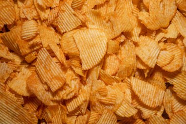 tasty crispy potato chips background