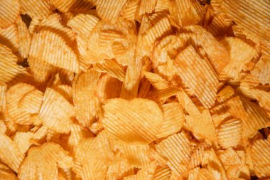 tasty crispy potato chips background