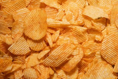 tasty crispy potato chips background