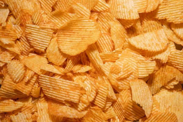 tasty crispy potato chips background