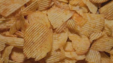 Patates cipsi yakın. Atıştırmalık fotoğraf.