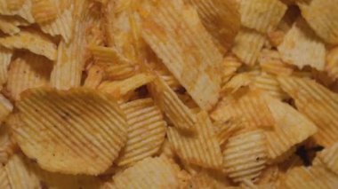 Patates cipsi yakın. Atıştırmalık fotoğraf.