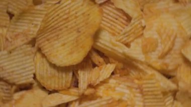 Patates cipsi yakın. Atıştırmalık fotoğraf.