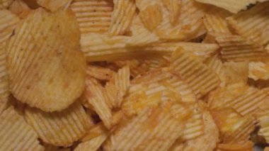 Patates cipsi yakın. Atıştırmalık fotoğraf.