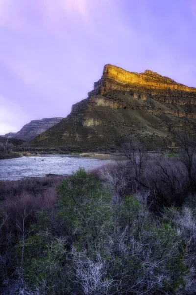 stock image Sunrise at James M. Robb State park in Palisade Colorado. The Colorado River flows beneath the buttes in Debeque Canyon