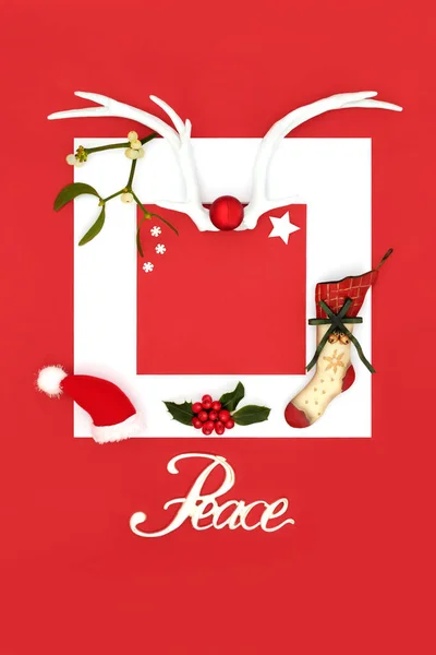 Christmas peace sign with reindeer antlers, santa hat, stocking, holly, mistletoe on red background with white frame border. Festive background traditional symbols for the holiday season.