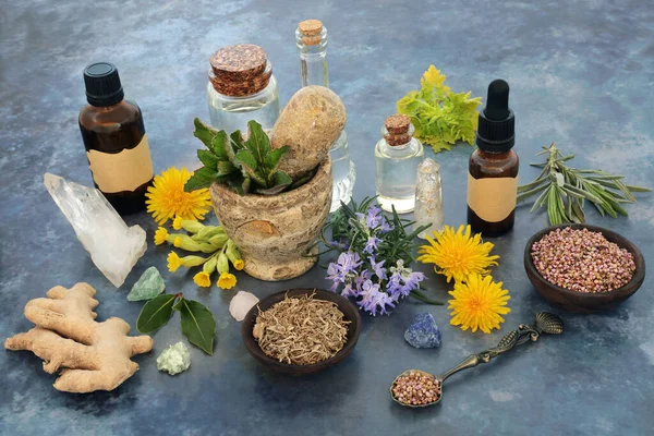 Alternative natural herbal remedy ingredients for plant medicine with healing crystals, herbs and aromatherapy essential oils. Nature, homeopathic, wiccan concept.