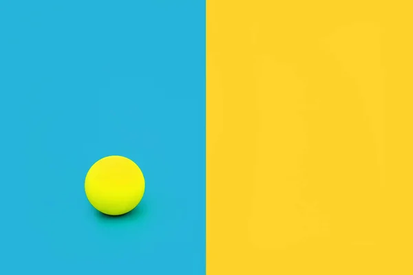 Dare to be different and independent concept with vivid blue and yellow contrast background with ball. Minimal solitary, alone, leadership, stand out in a crowd composition. Flat lay, copy space