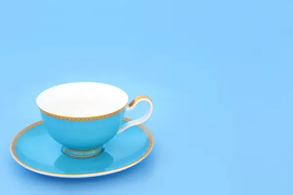Blaue Und Goldene Bone China Teetasse Vorhanden Elegantes Luxusgetränk Auf lizenzfreie Stockbilder