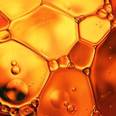 Turuncu su kabarcıkları soyut renkli arkaplan, su doğal arka plan olarak makroyu düşürür.