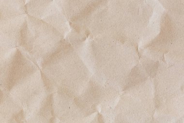 Buruşmuş ve buruşmuş ambalaj kağıdı dokusu arka plan makrosu.