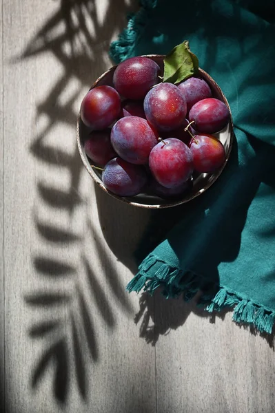Ripe Plums Wooden Table Flower Shadows — Stock Photo, Image