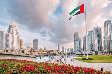 18 January 2023, Dubai, UAE: Scenic view of Dubai skyline, with the skyscraper buildings and national flag. Sightseeing and travel destinations in Arab Emirates clipart