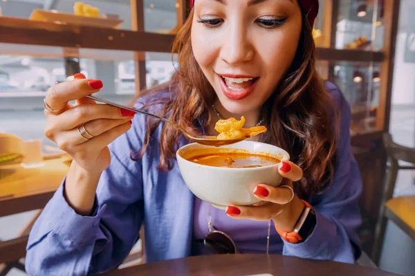 Happy Girl Eating Spicy Thai Soup Tom Yam Authentic Restaurant — Stock Photo, Image