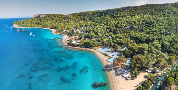 Stock image aerial paradise view, showcasing an idyllic harbor adorned with luxurious yachts and green forest in Kemer, Turkey