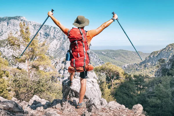 Happy Hiker Man Trekking Backpack Outstretched Arms Hiking Poles Rocky — Stock Photo, Image