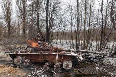 A tank of Russian invaders destroyed as a result of fierce and heavy fighting near a village Kuhari in the Kyiv region