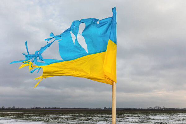 Russias war against Ukraine. Tattered but undefeated flag of Ukraine, Kharkiv region, December 2023