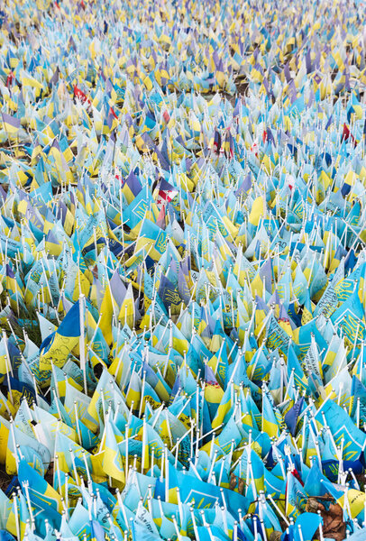 KYIV, UKRAINE - Feb. 18, 2024: A large number of Ukrainian flags on the central square of the capital with the names of prisoners and those who died in the war with Russia.