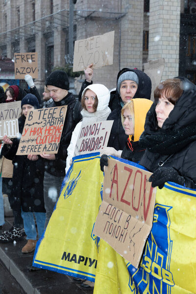 KYIV, UKRAINE - Feb. 18, 2024: A group of protesters is seen holding placards in support of Ukrainian prisoners of war on the central square of the Ukrainian capital.